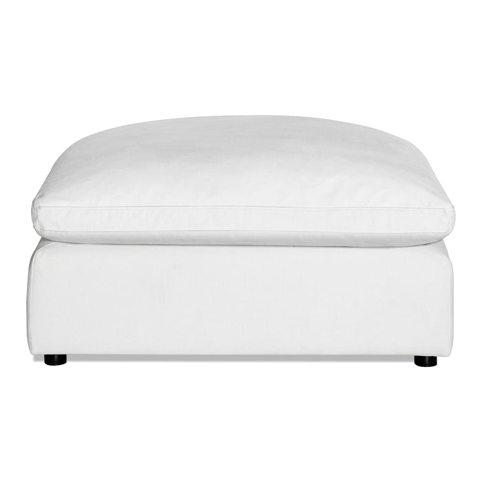 Discover the Peyton Ottoman, a white piece with plush cushions and short dark legs, boasting a minimalist design for a clean look that complements any space.