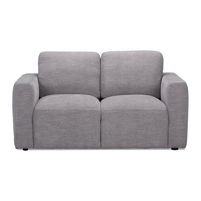 The Lugano Loveseat, part of the Lugano Sofa Set, is a modern gray piece with a minimalist design. It features plush back and seat cushions with wide armrests. Its textured fabric adds softness and style, perfect for contemporary or casual living spaces.