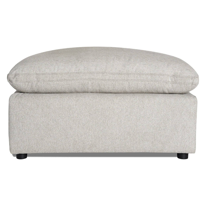 Introducing the My Cloud 40 Ottoman: A light gray rectangular ottoman with rounded edges, plush cushioned top, and small black legs. Its smooth soft fabric enhances comfort and matches personal style for customizable furniture bliss.