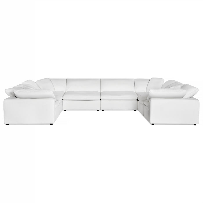 Experience the luxury of the Peyton 8 Piece Pit, a large, modern white sectional sofa blending style and comfort. Its versatile U-shape includes deep cushions and wide, pillow-like armrests set against a plain white background for timeless elegance.