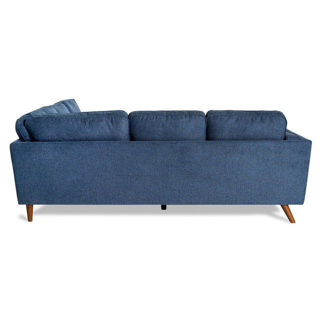 The Maddox sofa, perfect for a mid-century modern living room, features a blue fabric finish with three cushions and wooden legs in a minimalist design.