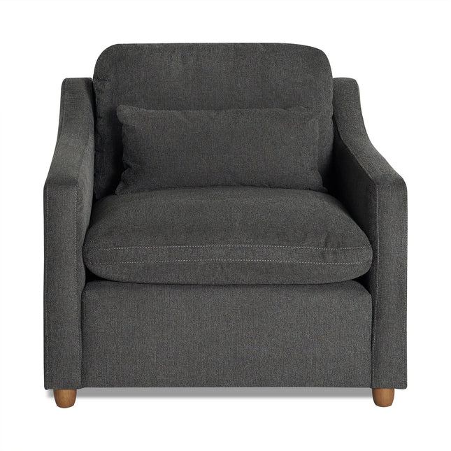 The My Cloud Slope Chair is a dark gray upholstered armchair with a square backrest, wide seat cushion, matching lumbar pillow, and light wooden legs. It offers a modern, minimalist design ideal for your living room or office.