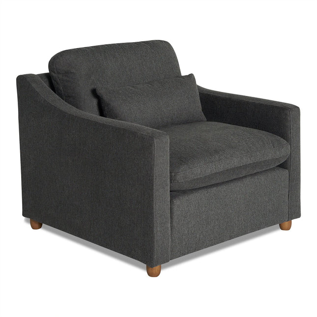 Introducing the My Cloud Slope Chair: a dark gray armchair with a plush backrest and seat cushion. This comfortable piece comes with a matching lumbar pillow and wooden legs, offering both modern flair and ultimate coziness.