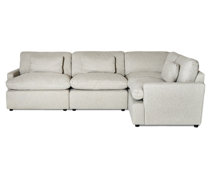 Introducing the My Cloud 4 Piece Right L: a light gray, L-shaped sectional with three plush cushions and ample seating. Its minimalist design, set against a white background, offers ultimate comfort and style for any modern home.