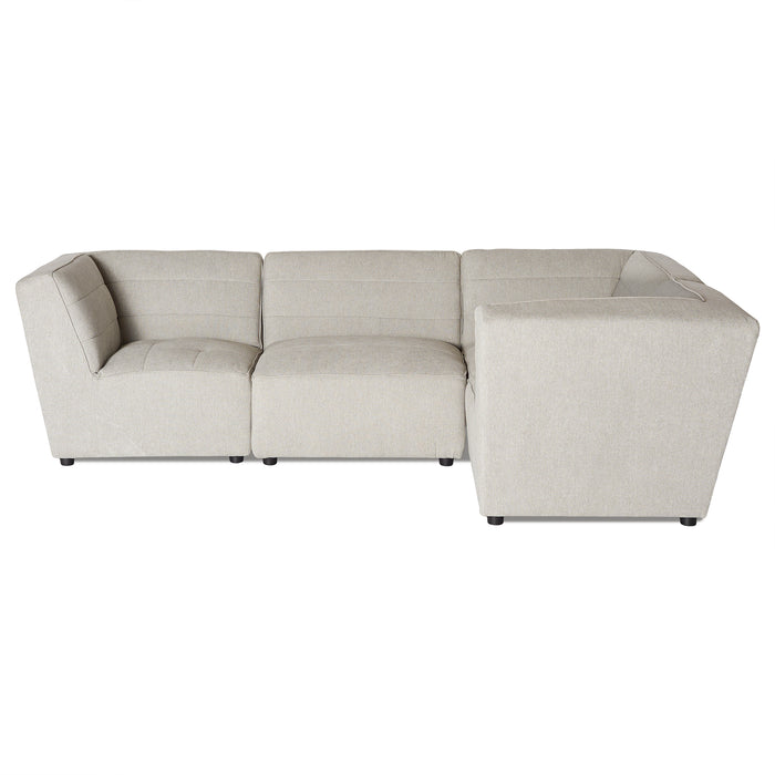 Discover the modular flexibility of the Millenium 4 Piece Right L, a light gray L-shaped sectional with three seats, a corner piece, and tufted cushions. Designed with subtle horizontal seams, it rests on sleek black feet for an elegant finish.