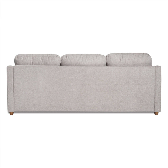 The back view of the My Cloud Slope Sofa showcases its light gray color, three large cushions, and epitomizes comfort with a simple modern design. It features flat armrests, subtly visible wooden legs, and soft textured fabric for an inviting experience.