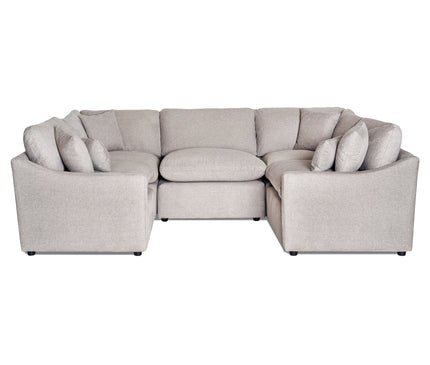 The My Cloud Slope 5 Piece Pit is a spacious, beige U-shaped modular sectional sofa with multiple plush cushions. Made from machine-washable fabric, its set against a white background, offering an inviting relaxation spot.