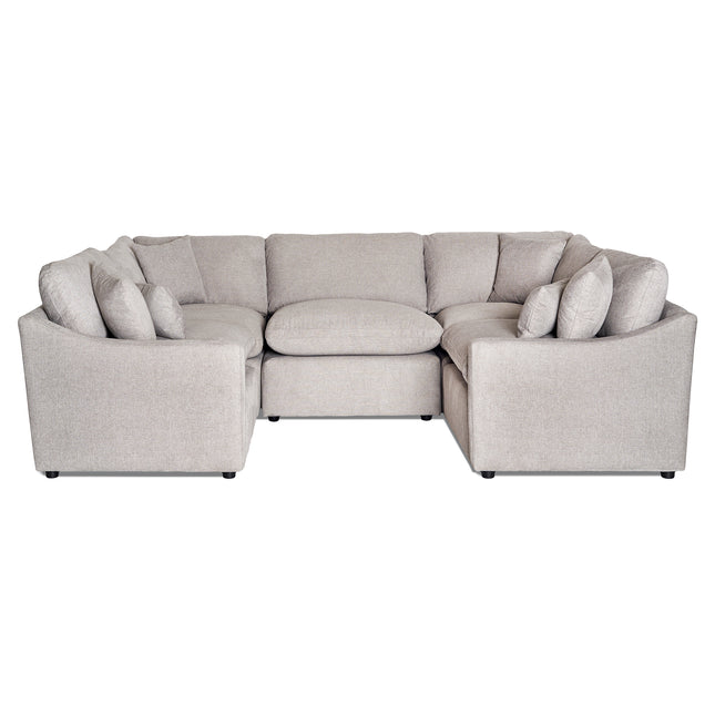 The My Cloud Slope 5 Piece Pit is a spacious, beige U-shaped modular sectional sofa with multiple plush cushions. Made from machine-washable fabric, its set against a white background, offering an inviting relaxation spot.