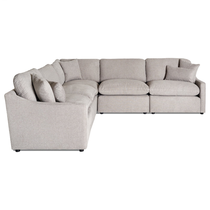The My Cloud Slope 5 Piece L is a large, L-shaped beige sectional sofa with multiple cushions. Its clean, modern design and soft fabric upholstery invite relaxation and style into any living space, all set against a plain white background.