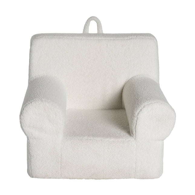 The My Cloud Kidz Chair is a plush white childrens armchair with soft Sherpa fabric, rounded armrests, and a rectangular backrest. A small fabric loop on top allows for easy carrying or hanging.