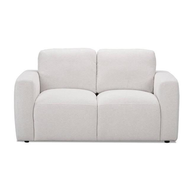 The light gray Lugano Loveseat features plush flat cushions for both the seat and back, complemented by wide armrests. Its minimalist design captures Italian luxury and is showcased against a white background.