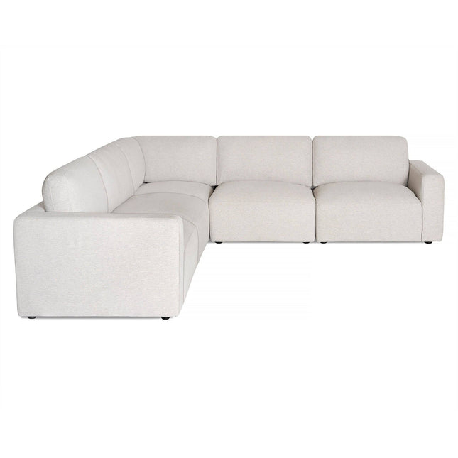 A large, modern L-shaped sectional sofa with white fabric upholstery, named Free Fabric Swatches. The design is minimalist, featuring clean lines and rectangular cushions, perfect for a contemporary living room.