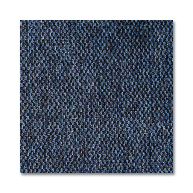 Close-up of a textured denim swatch, showcasing a woven pattern in blue shades. The Free Fabric Swatches feature a tightly knit surface for the classic denim look.