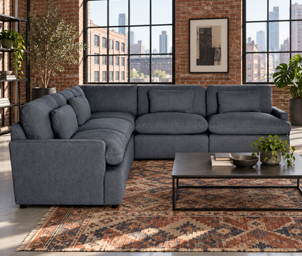 My Cloud 5 Piece L in Slate Blue, shown in a brick loft