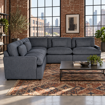 My Cloud 5 Piece L in Slate Blue, shown in a brick loft