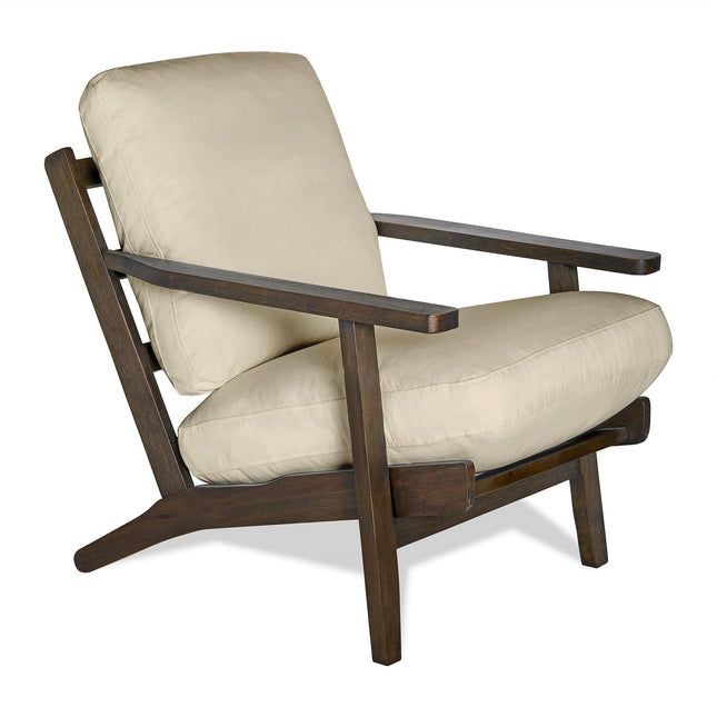 The Peyton Chair is a wooden armchair with a plush, beige cushioned seat and backrest. It features a mid-century style, dark wooden frame, and angled armrests for a classic and comfortable look.