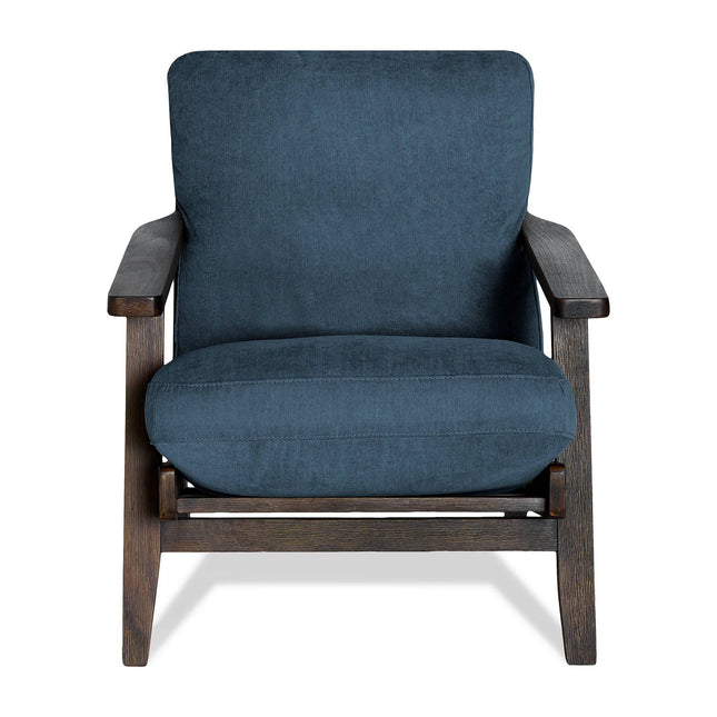 The Peyton Chair is a comfortable armchair featuring a sleek dark wood frame and deep blue fabric cushion. Its mid-century style highlights plush seating and sturdy armrests, combining elegance with functionality.