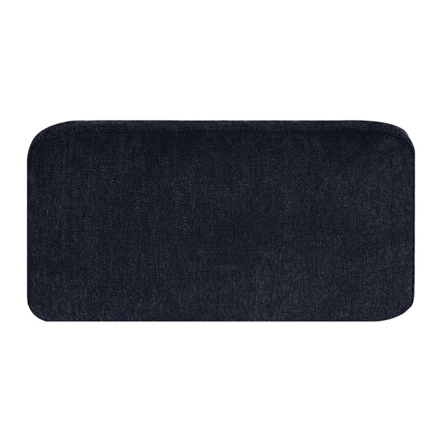 The My Cloud Pillow is a rectangular black cushion with rounded corners and a textured fabric surface, ideal as an accent piece for a sectional sofa. Its shown on a plain white background.
