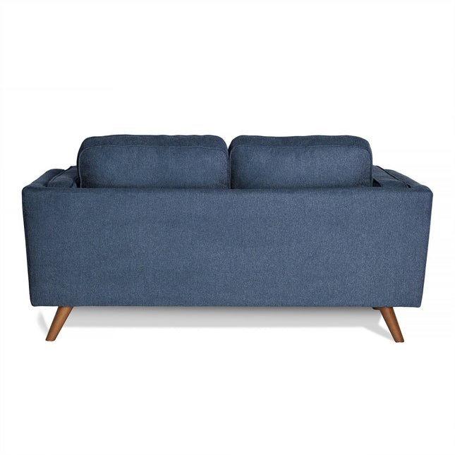 The Maddox Loveseat, seen from behind, is a blue mid-century modern piece with two plush cushions and angled wooden legs.