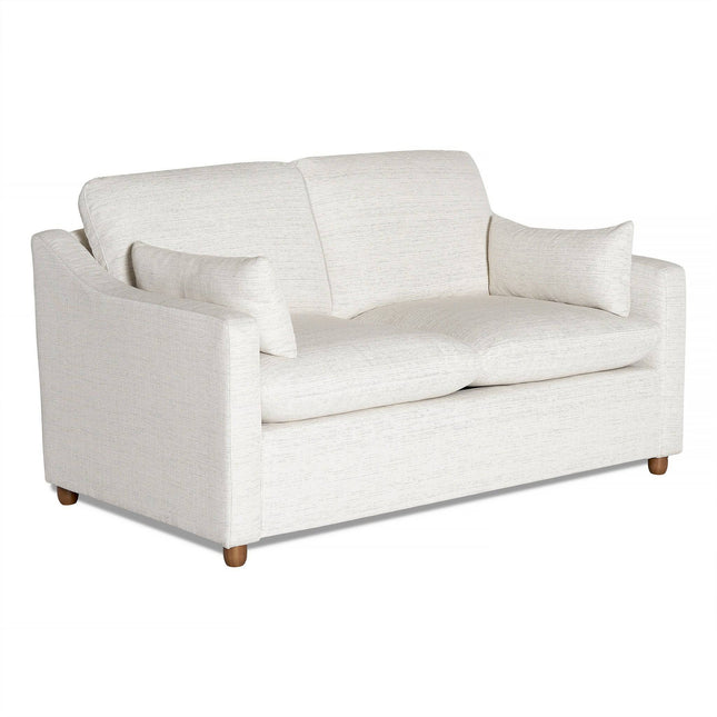 Discover the My Cloud Slope Loveseat, a sleek white design with plush cushions and matching side pillows. This customizable piece boasts a minimalist style with angled arms and robust wooden legs, ideal for modern living rooms.