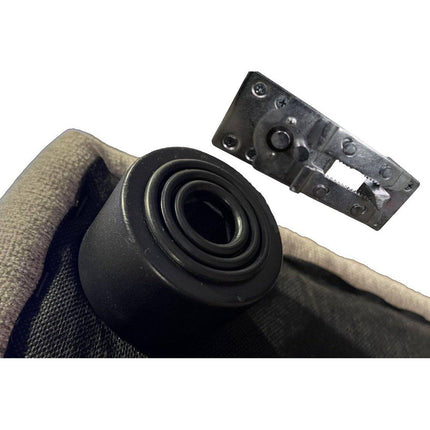 Close-up of an Alligator Locks skateboard wheel and metallic truck detached from the board on a plain white background. The wheel is black, and fabric-wrapped edges of the skateboard deck are visible.