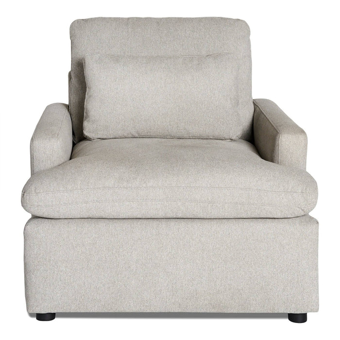 Introducing the My Cloud Chair: a plush, light gray armchair with a cushioned seat and backrest, featuring flat armrests and a matching rectangular pillow for customizable comfort. It stands on low black cylindrical legs, adding modern elegance to any space.