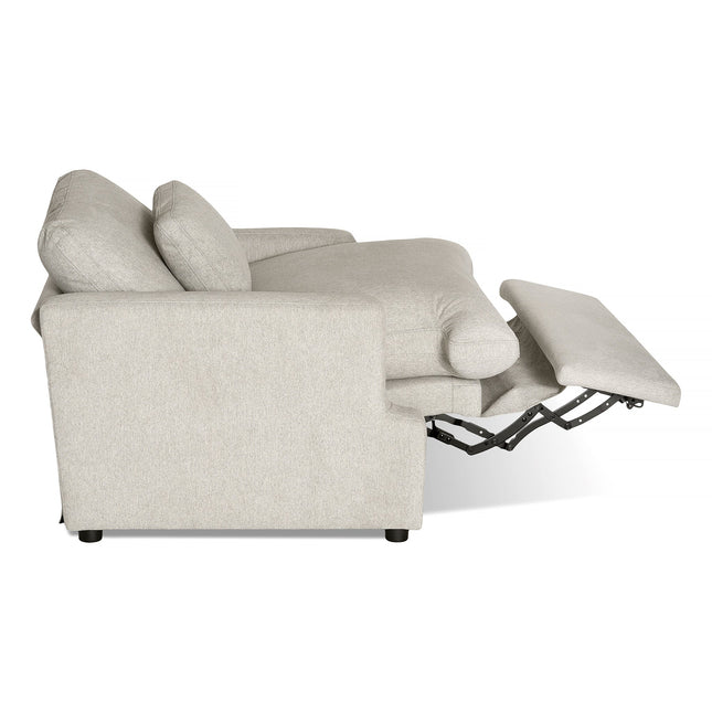 A side view of the My Cloud Power Recliner, featuring an extended footrest mechanism that highlights its reclining function. This cozy furniture piece offers thick cushions and a sleek, modern design.