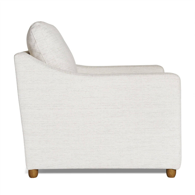 Side view of My Cloud Slope Chair, a modern sofa with light gray fabric. It features a cushioned backrest and armrests, supported by compact, slightly tapered wooden legs, exemplifying comfortable furniture with its minimalist and contemporary design.