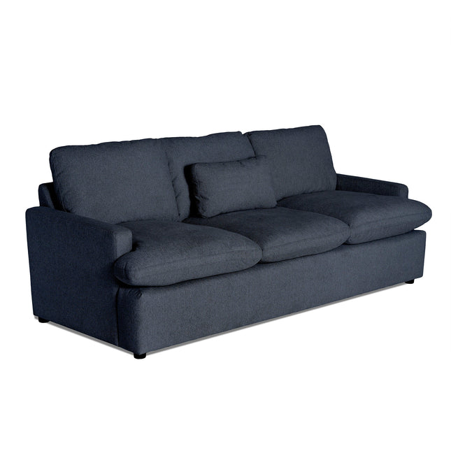 The My Cloud Sofa is a comfortable piece with a cushioned dark gray design, featuring three seat cushions and several back cushions. Its modern look is enhanced by wide armrests and subtly hidden legs.