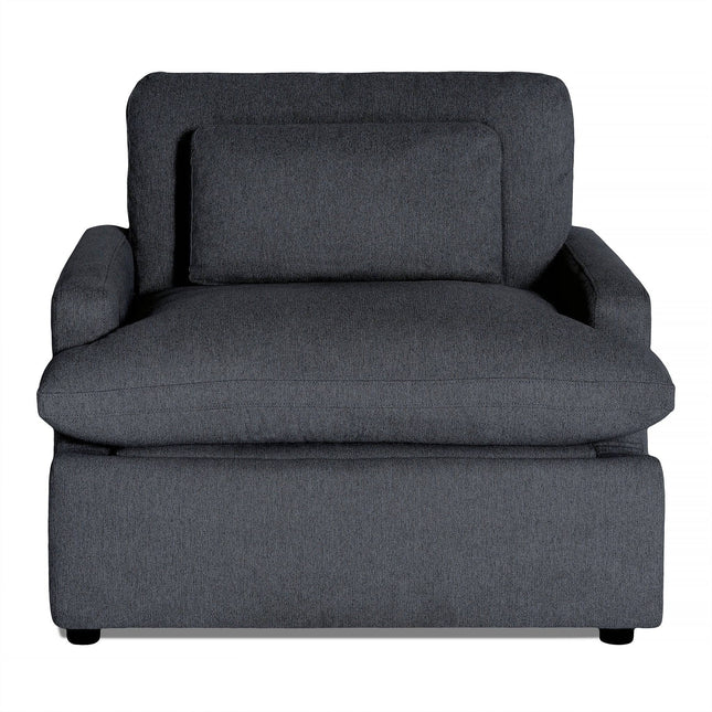 The My Cloud Power Recliner, a large dark gray upholstered armchair, features a plush back cushion, wide seat, and thick cushioned armrests that promise comfort. Its sturdy base conceals customizable features enhancing its appeal.