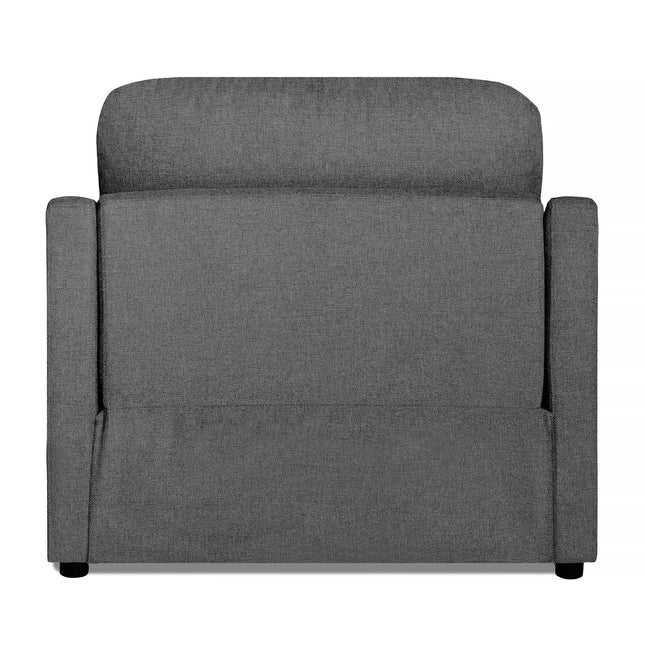 Back view of the My Cloud Slope Power Recliner, a modern dark grey armchair featuring a high backrest and cushioned armrests. Its smooth, slightly textured fabric adds appeal. This comfy piece sits on small, round black feet visible at the bottom corners.