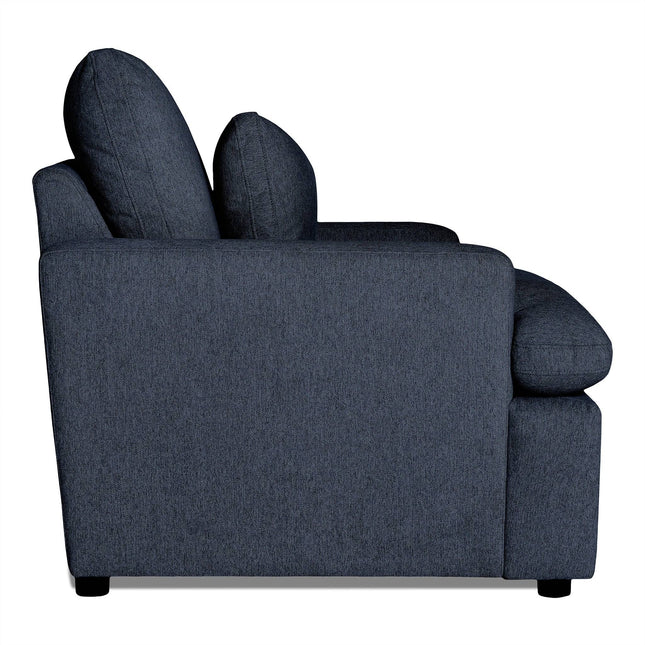 Side view of the My Cloud Chair, a dark blue upholstered sofa with two large back cushions. Featuring a modern rectangular design, this comfortable piece is set against a white background, emphasizing its minimalist style and soft texture.