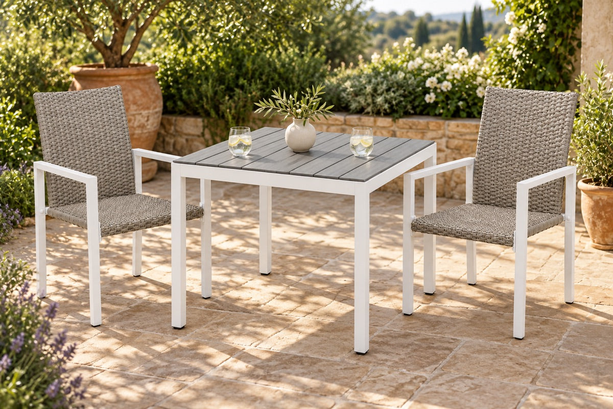 In-stock Winston patio table and rattan chairs in a garden